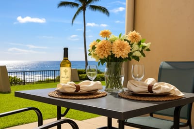 Unwind on this breezy oceanfront lanai, where every meal is enhanced by lush garden views, sea-kissed air, and serene island vibes