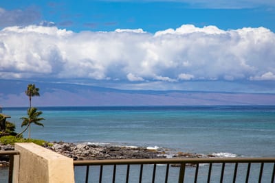 Tranquil waves meet horizon in this unforgettable oceanfront paradise escape.