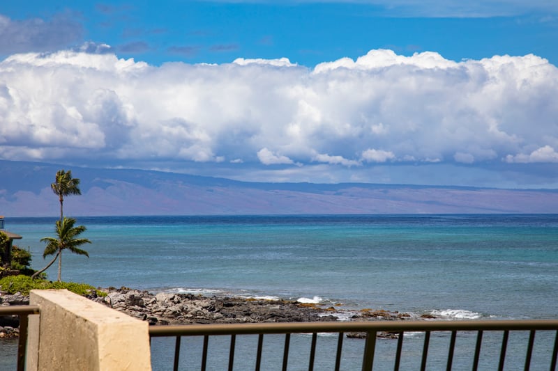 Tranquil waves meet horizon in this unforgettable oceanfront paradise escape.