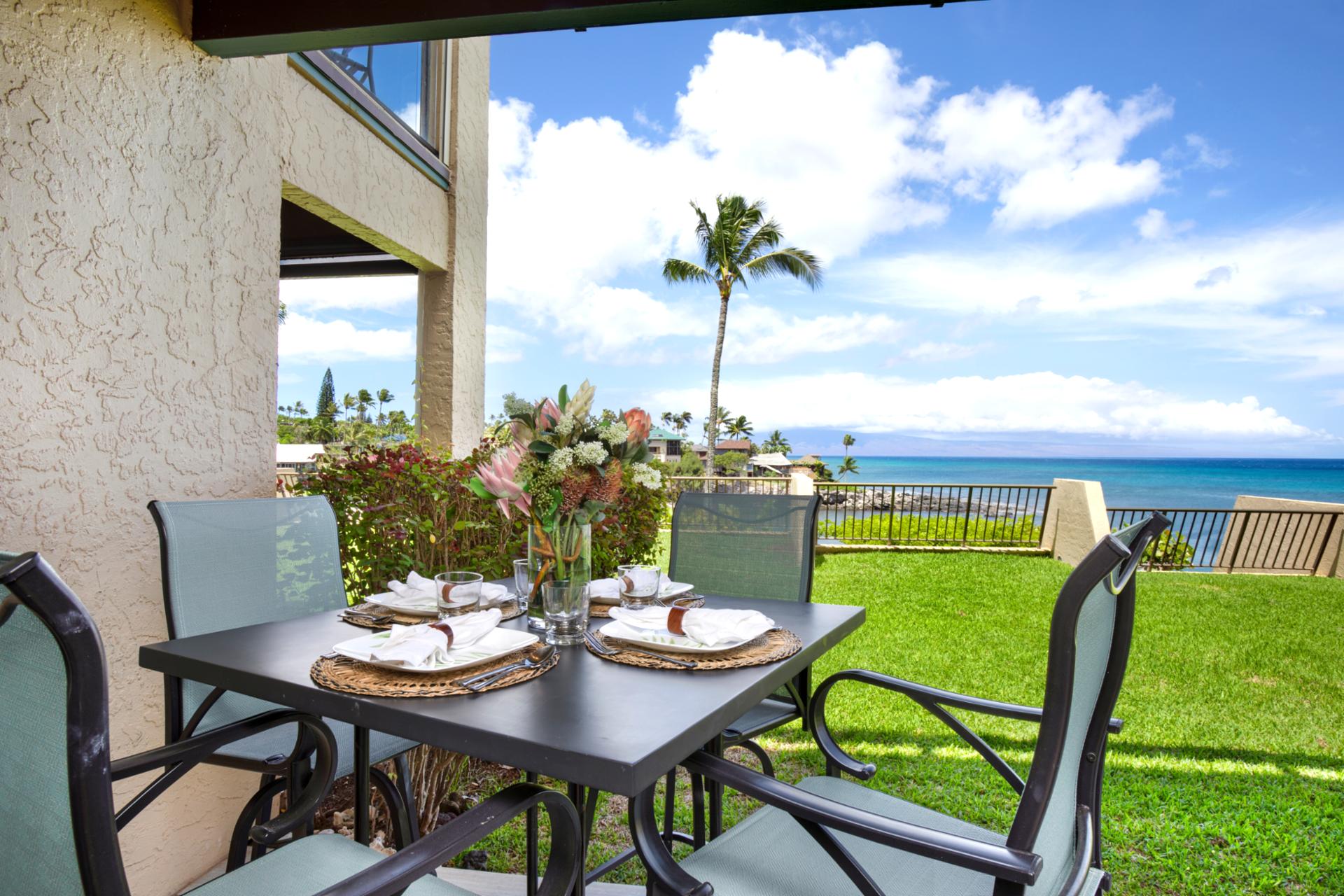 Dine al fresco by the ocean with a serene view, swaying palms, and island breeze. NAP-B26