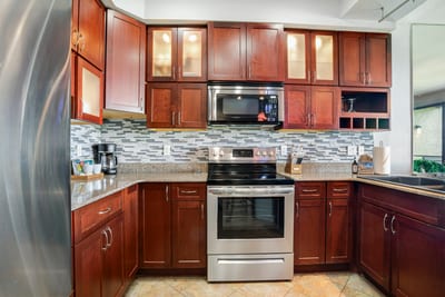 Sophisticated finishes meet casual island comfort in this stylish kitchen.