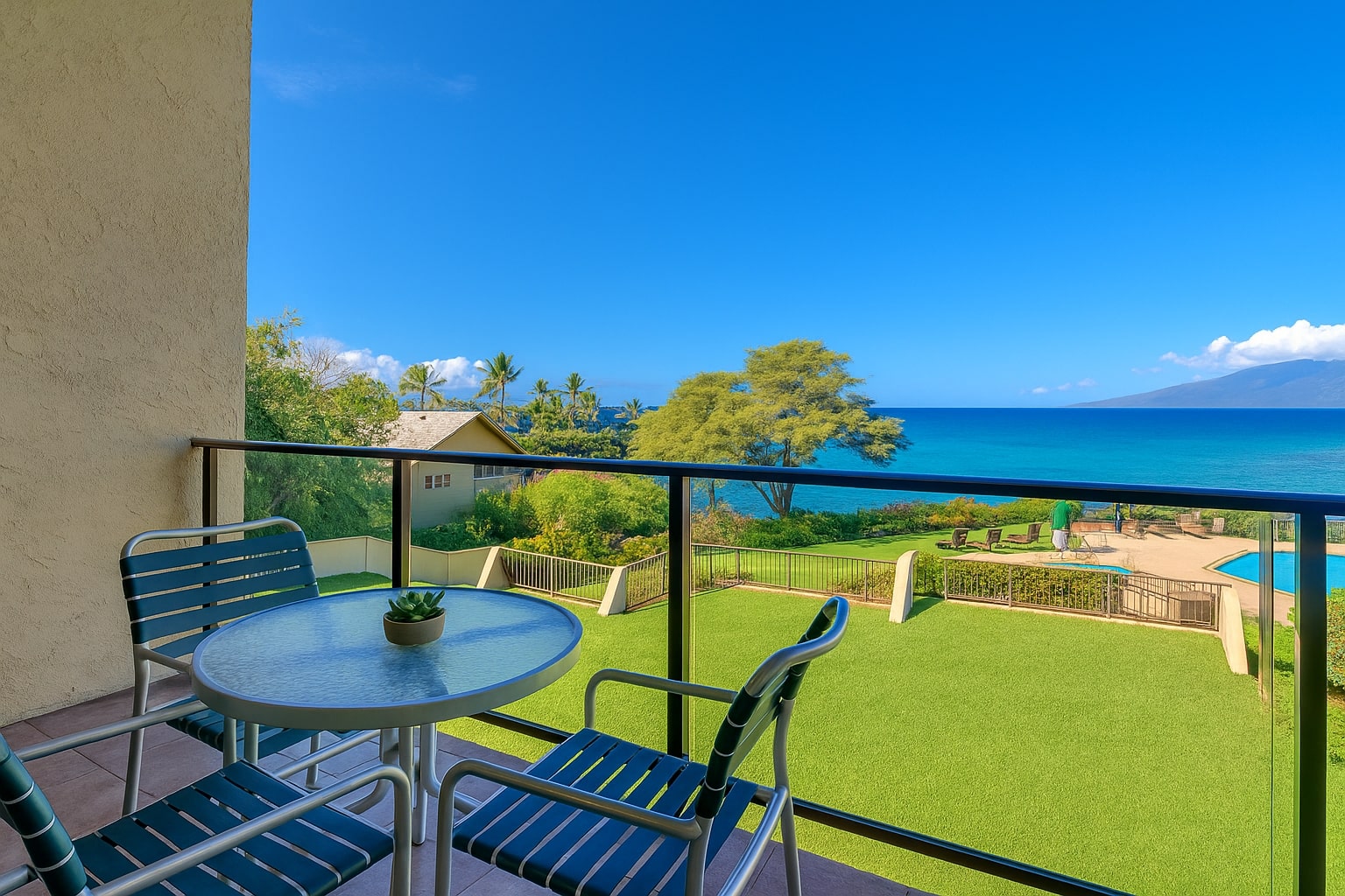 Start your day on the lanai with coffee and ocean views—where every breeze whispers tropical calm     NAP-C42