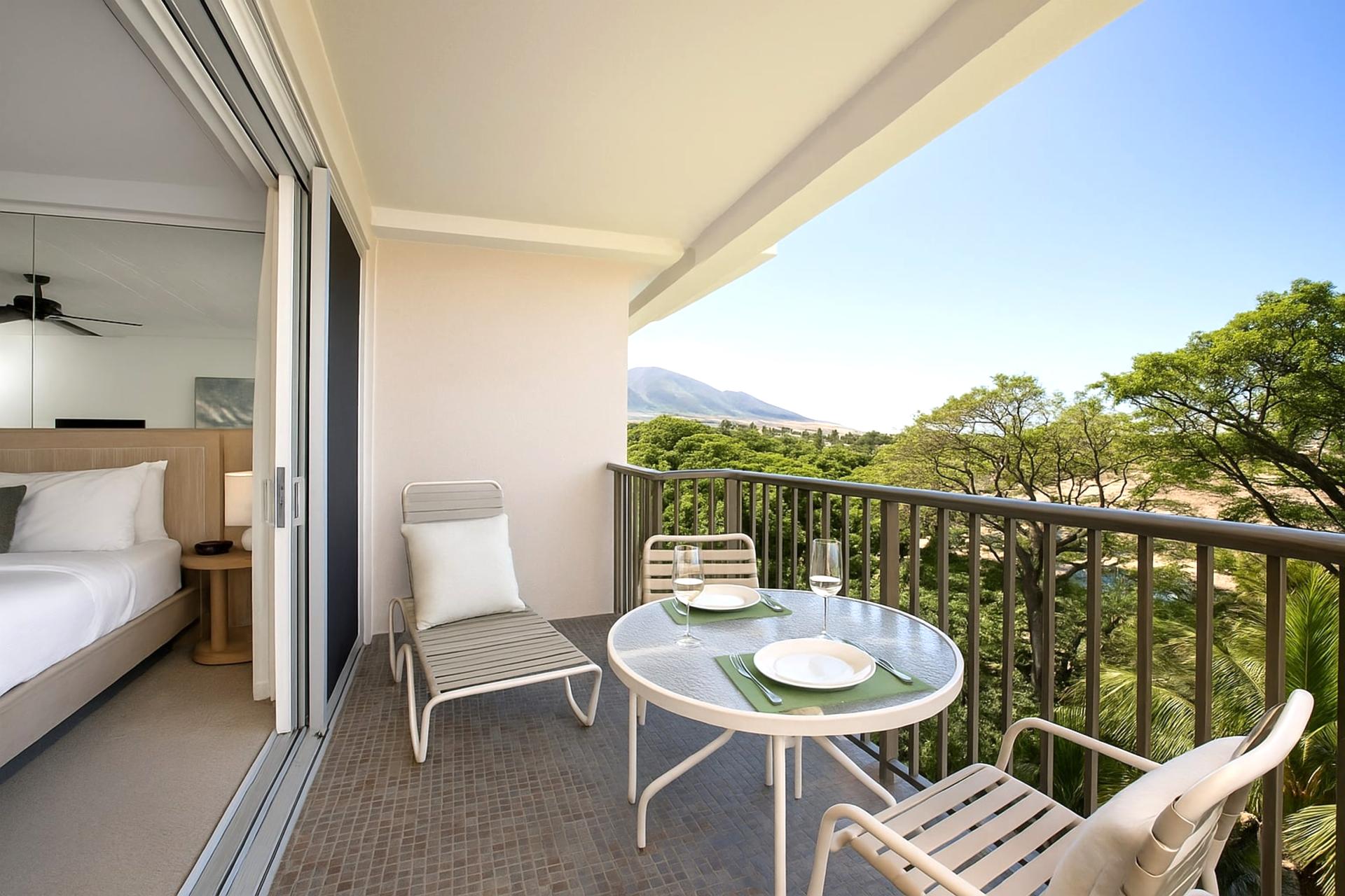 Start your day with fresh island air and a coffee al fresco, where mountain peaks and palms stretch into blue skies WH2-661