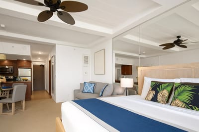 Sip coffee on the balcony or sink into island vibes indoors—this breezy suite is peace with a playful twist