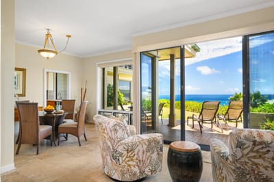 This bright and airy living space offers seamless flow to the lanai and lush surroundings KBV-34G4