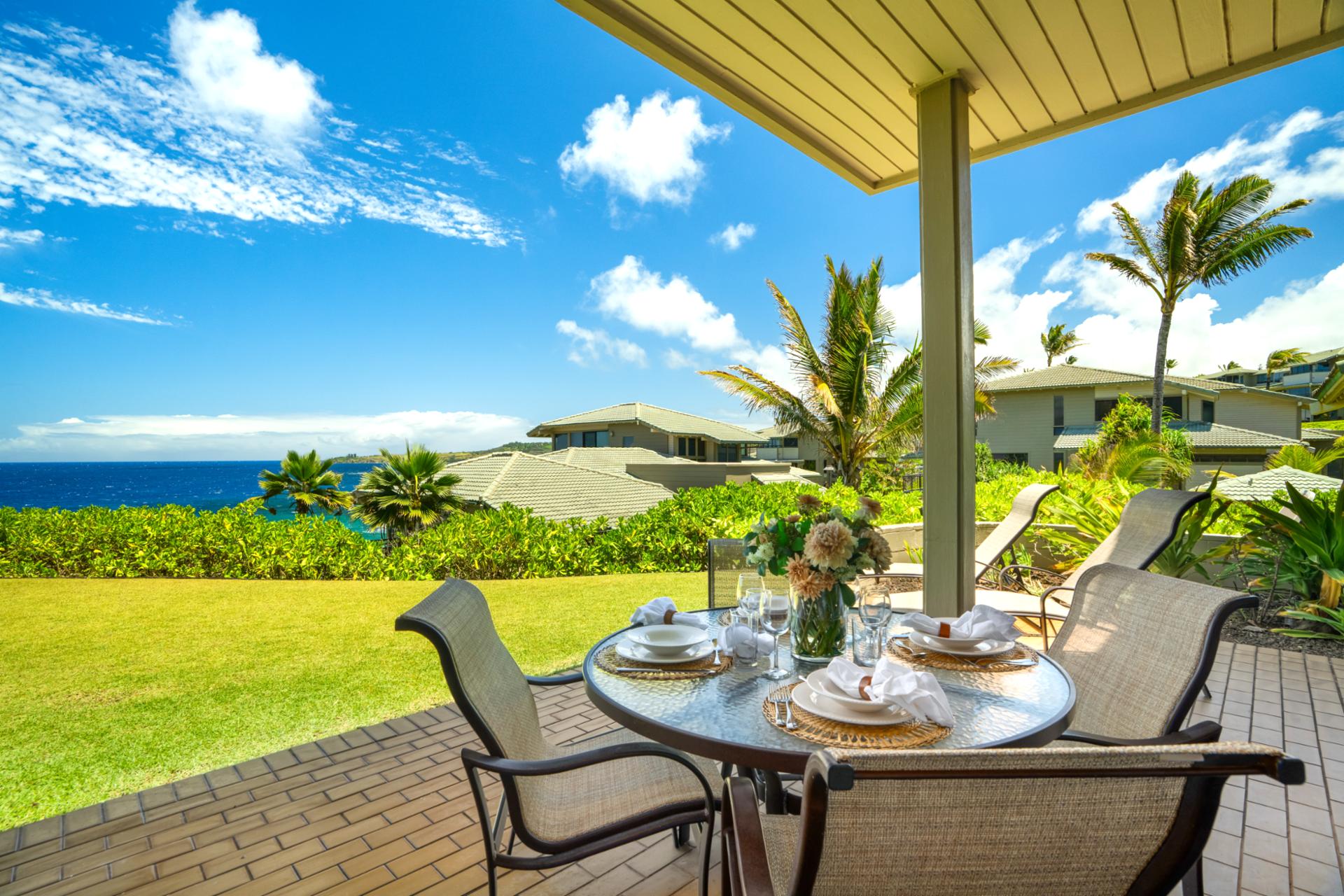 Enjoy al fresco dining with lush garden views and swaying palms just steps away