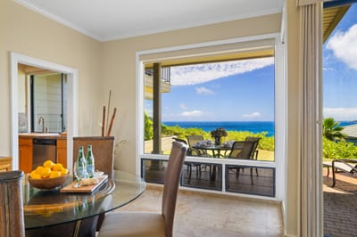 Dine indoors with expansive windows framing picturesque island views KBV-34G4