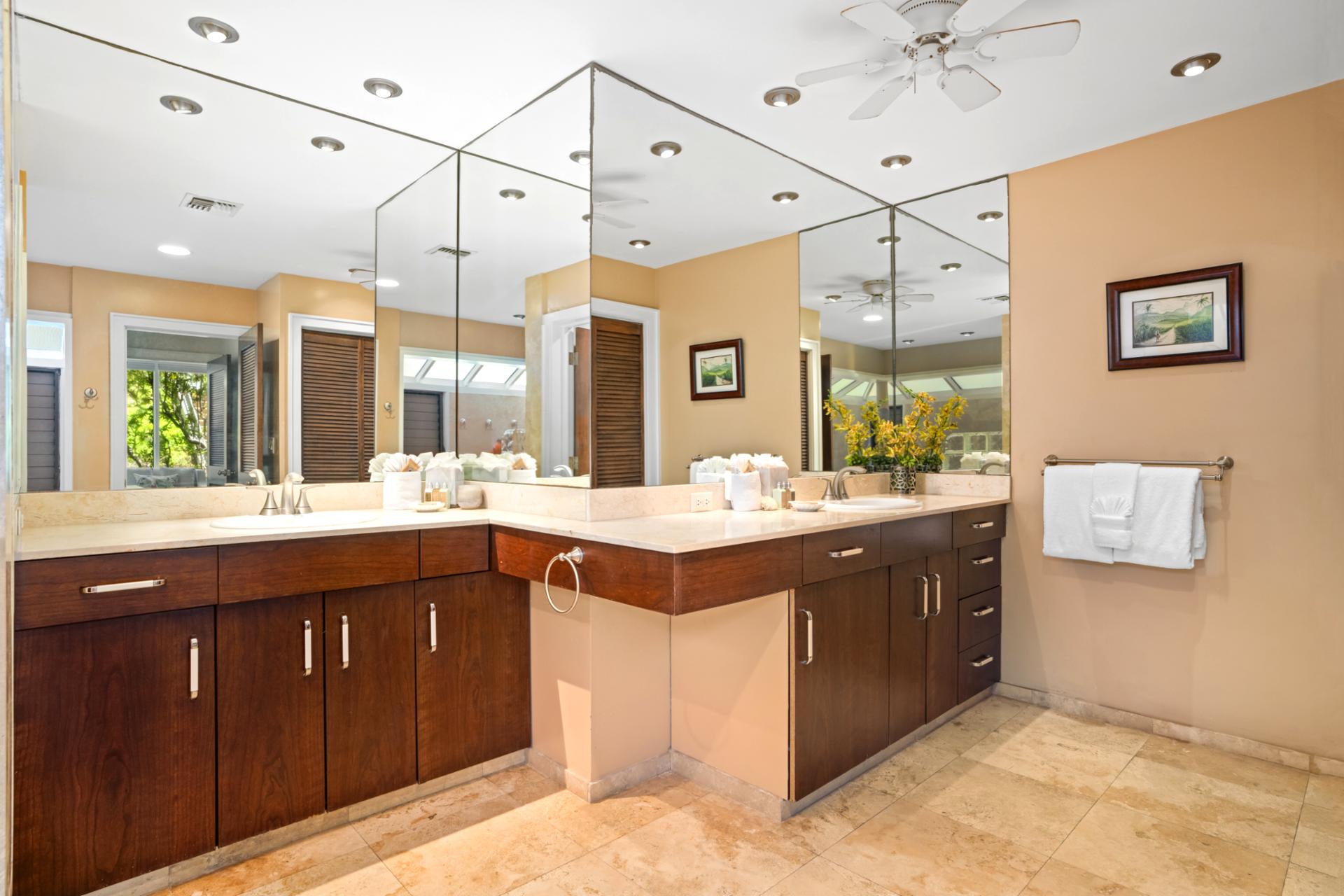 A dual vanity and natural light make this master bath both beautiful and practical