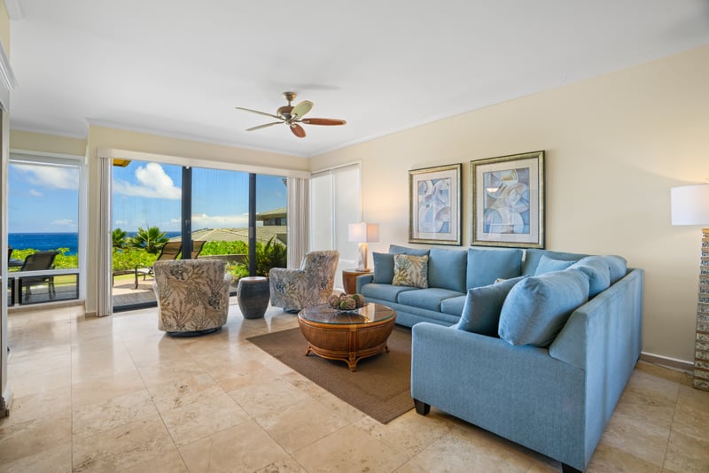 This bright and airy living space offers seamless flow to the lanai and lush surroundings KBV-34G4