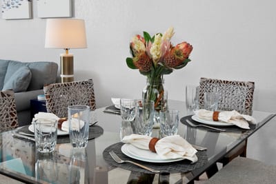 Leopard-spotted chairs and fresh tropical florals make every bite feel like a wild, luxurious adventure in paradise GCH-120
