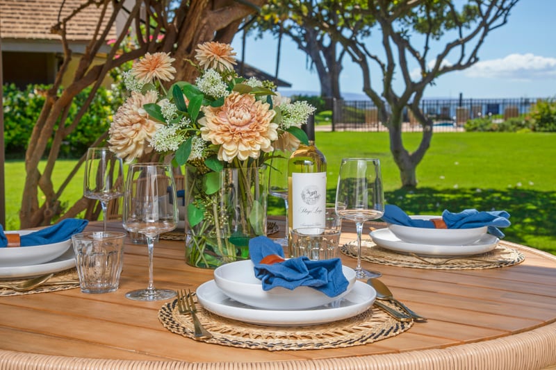 Dine alfresco with front-row seats to paradise, where even the shadows of palm trees join the party on your table