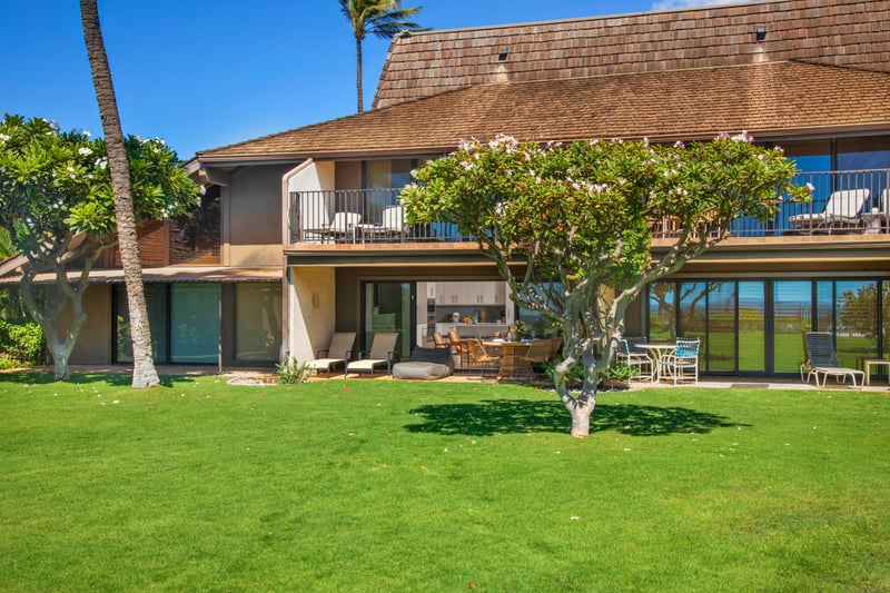 This isn't just a lawn—it's a launchpad for beachy adventures, midday naps, or twilight storytelling under the stars