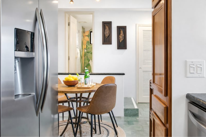 Fully equipped kitchens include modern appliances, granite countertops, and everything needed to prepare meals during your stay.