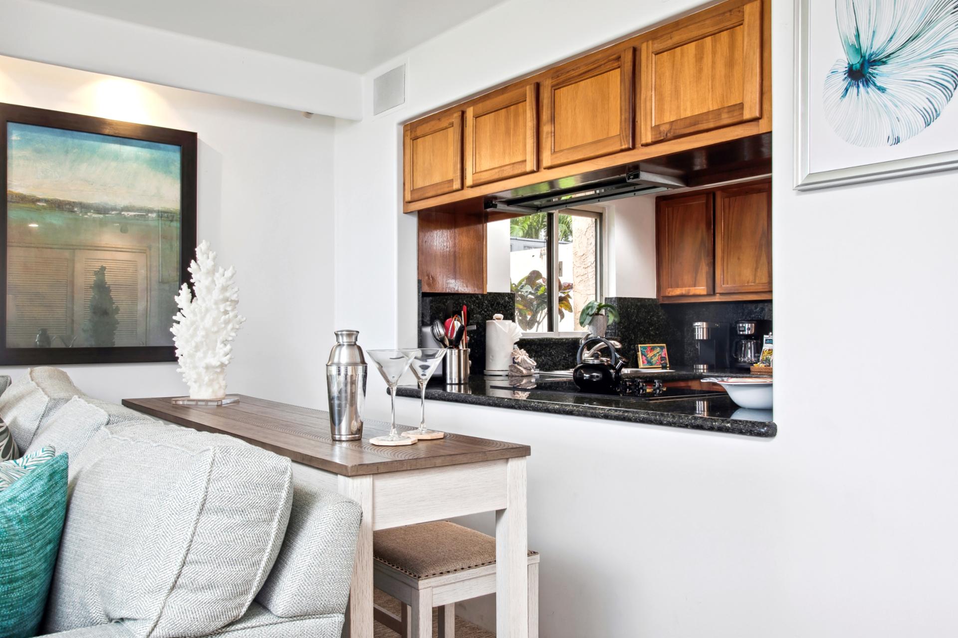 Fully equipped kitchens include modern appliances, granite countertops, and everything needed to prepare meals during your stay.