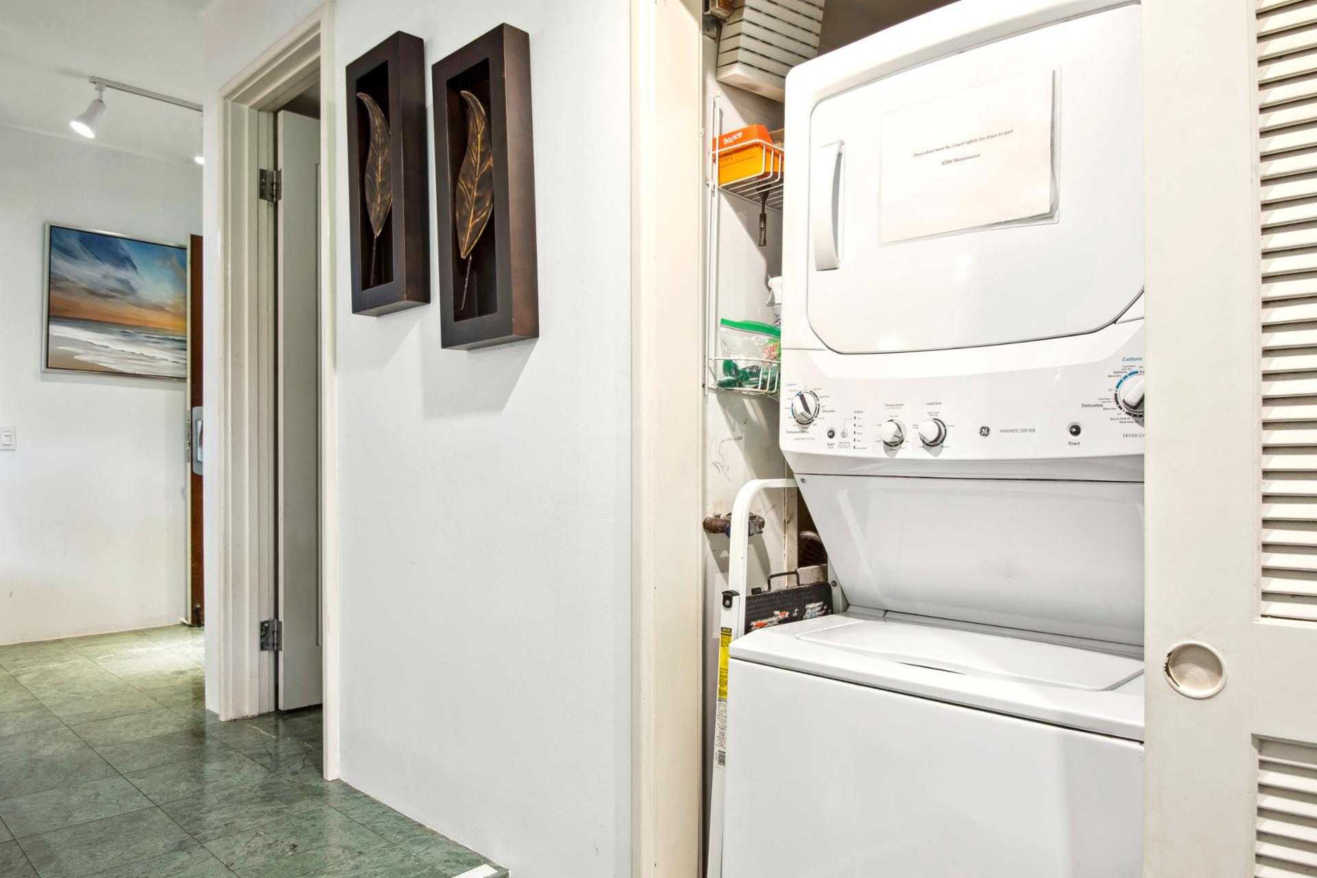 Laundry day just got an upgrade—tucked discreetly behind a louvered door, your clean-clothes fairy tale awaits
