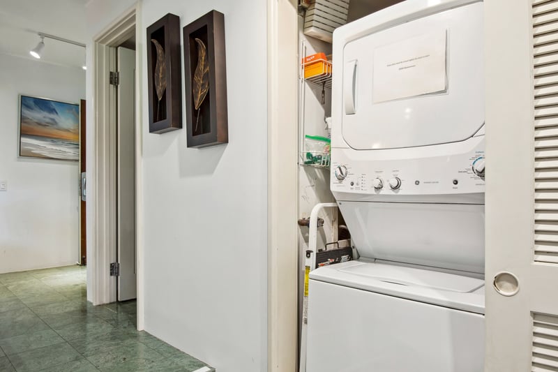 Laundry day just got an upgrade—tucked discreetly behind a louvered door, your clean-clothes fairy tale awaits
