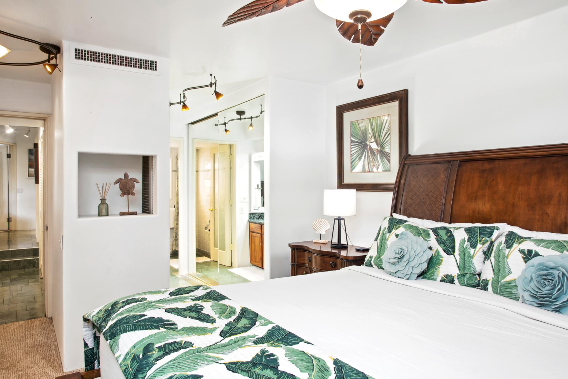 Elegant wood-carved furnishings and natural light-filled space create the perfect sanctuary for restful island nights