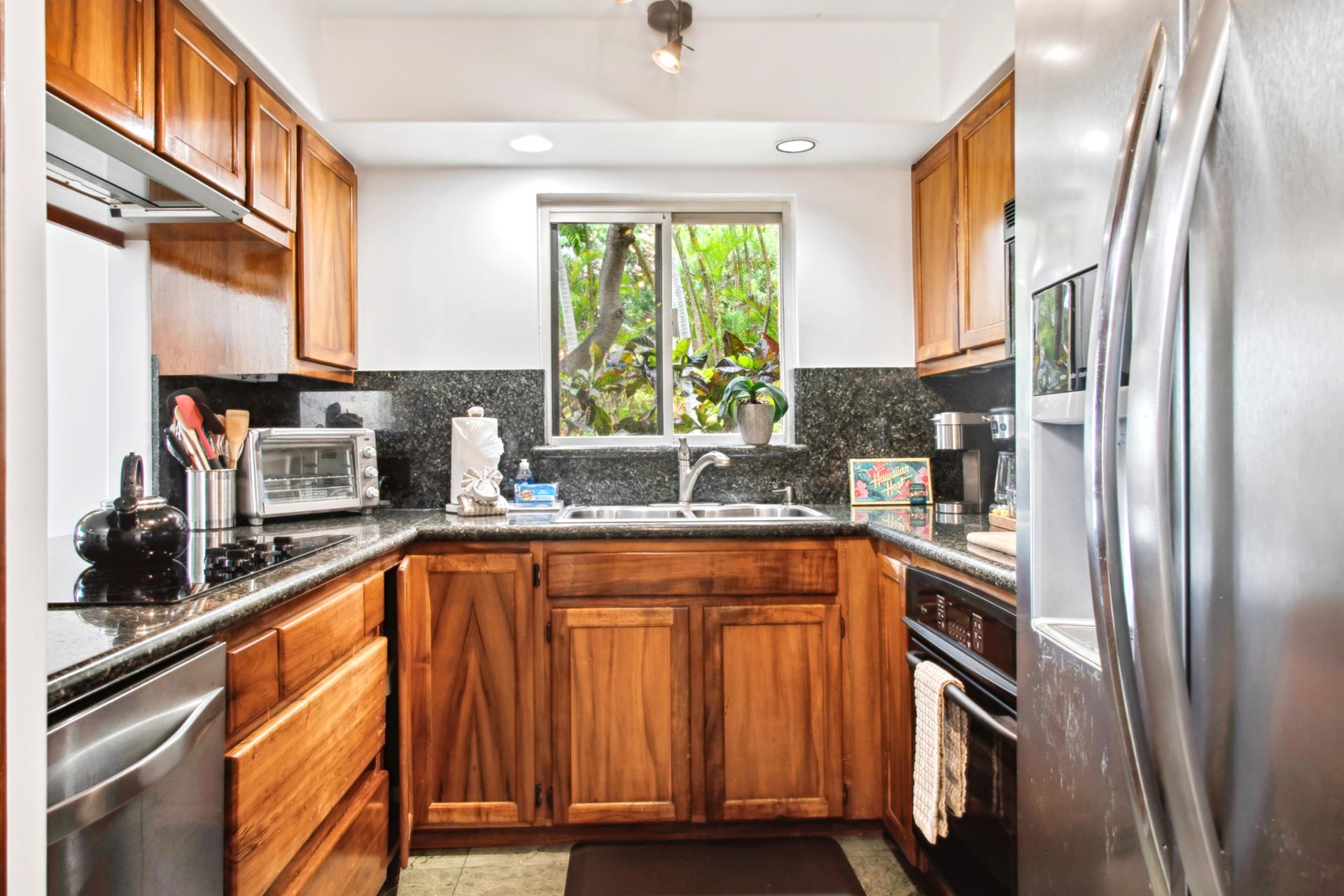 Fully equipped kitchens include modern appliances, granite countertops, and everything needed to prepare meals during your stay.
