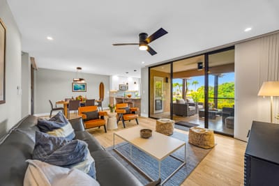 The open concept floor plan with floor to ceiling glass windows allows you to enjoy abundant natural light during your stay