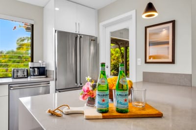 A sunny kitchen ready for breakfast and beach day planning