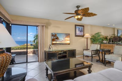 This living room is where elegance puts on flip-flops and invites you to stay awhile with a tropical wink