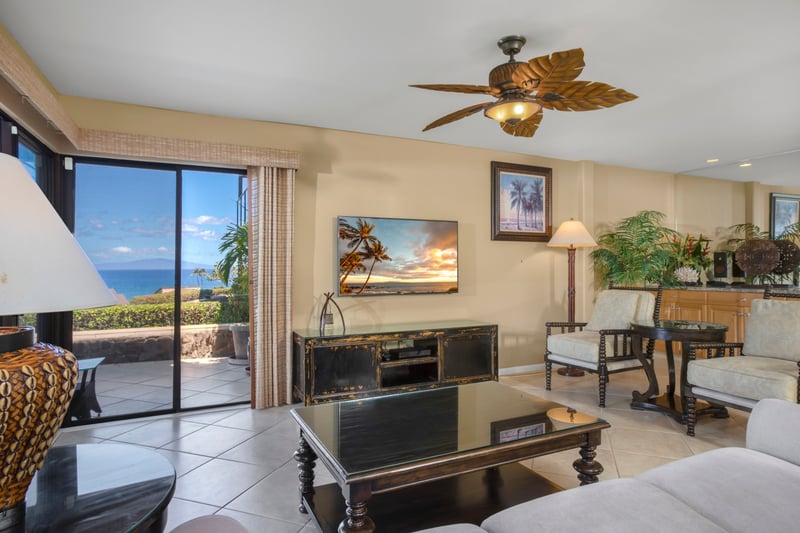 This living room is where elegance puts on flip-flops and invites you to stay awhile with a tropical wink