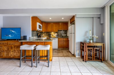 This open-concept kitchen with bar seating is perfect for casual dining and morning coffee chats.
