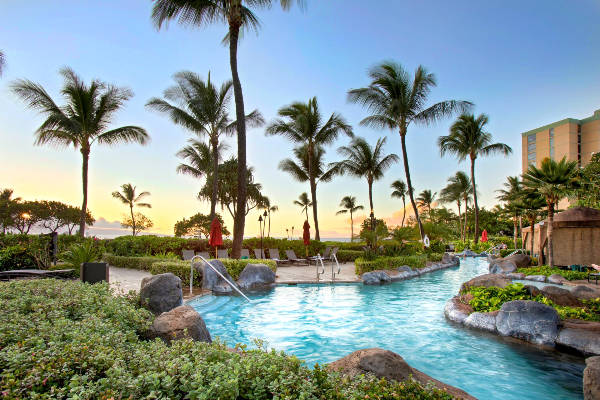 Dive into paradise at Honua Kai pristine swimming pools, perfect for lounging or enjoying fun-filled moments with family and friends.