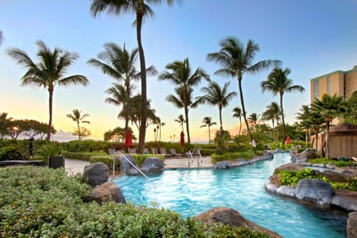 Dive into paradise at Honua Kai pristine swimming pools, perfect for lounging or enjoying fun-filled moments with family and friends. HKH-114
