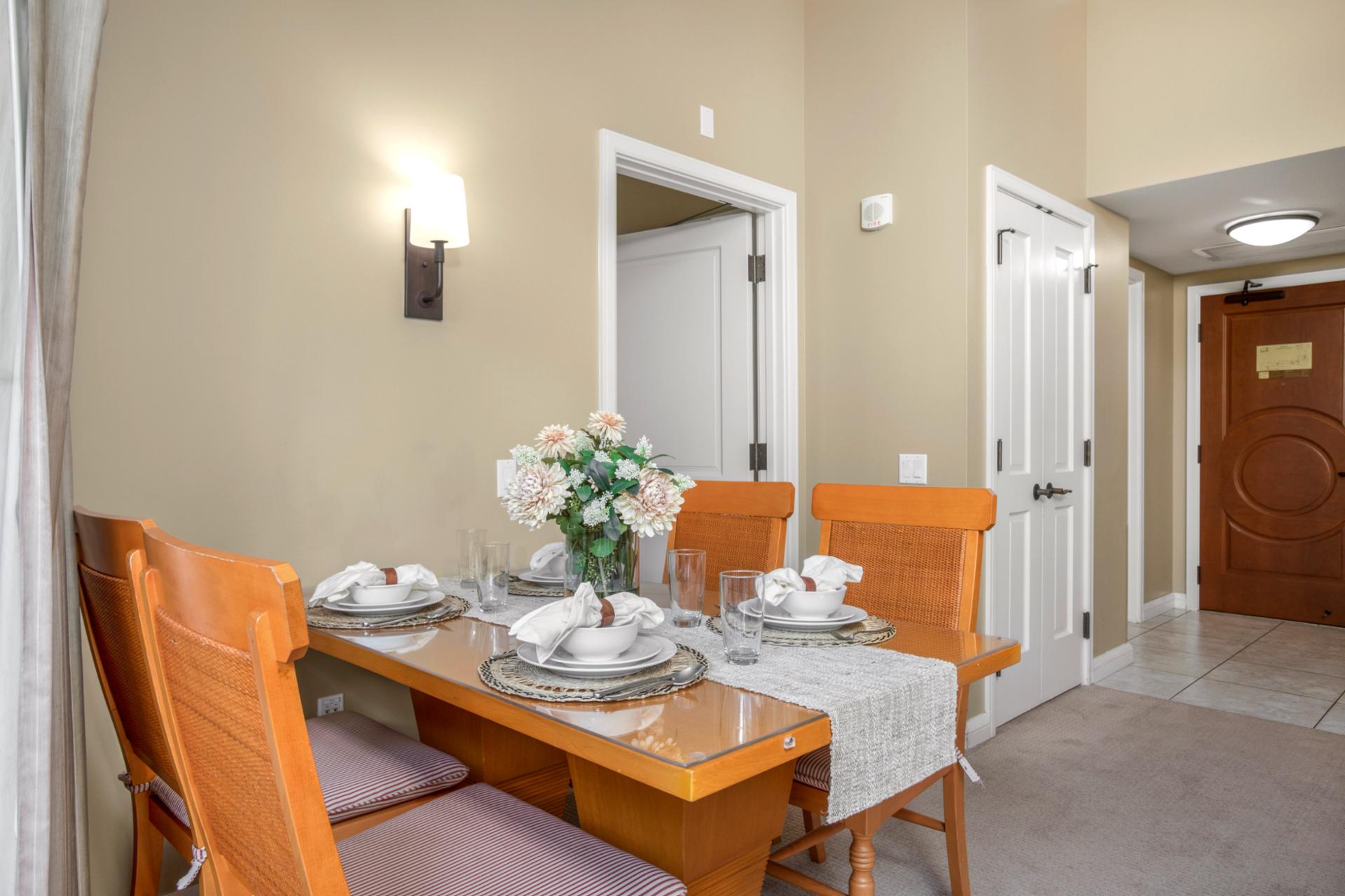 Table set for elegance with crystal glassware and florals.