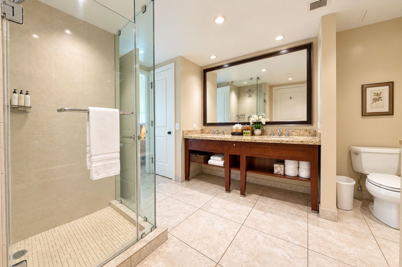 Refresh in the spa-like Master Bathroom, complete with an expansive double vanity and a glass-enclosed walk-in shower. HKH-114