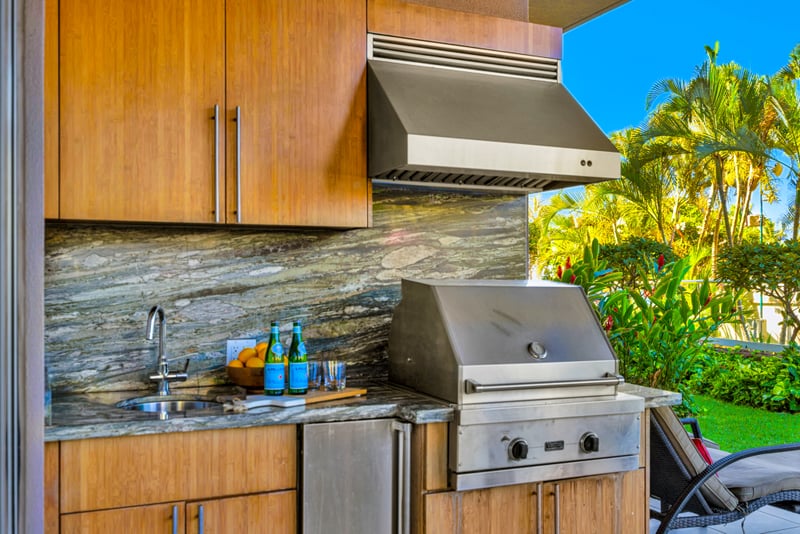 Living room at Honua Kai HKH-150 — comfortable seating with a direct beach and ocean view through the sliders
