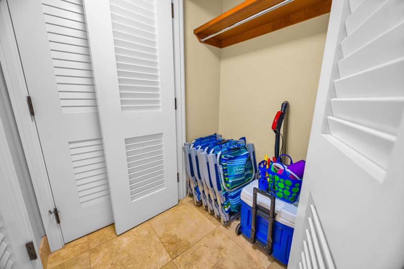 Beach gear closet at Honua Kai Hokulani 150 — complimentary beach chairs, cooler, and beach toys ready to grab for a day at Kaanapali