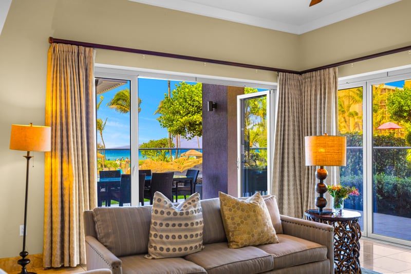 Direct beachfront view at Honua Kai HKH-150 — unobstructed sand and ocean seen straight from the living room