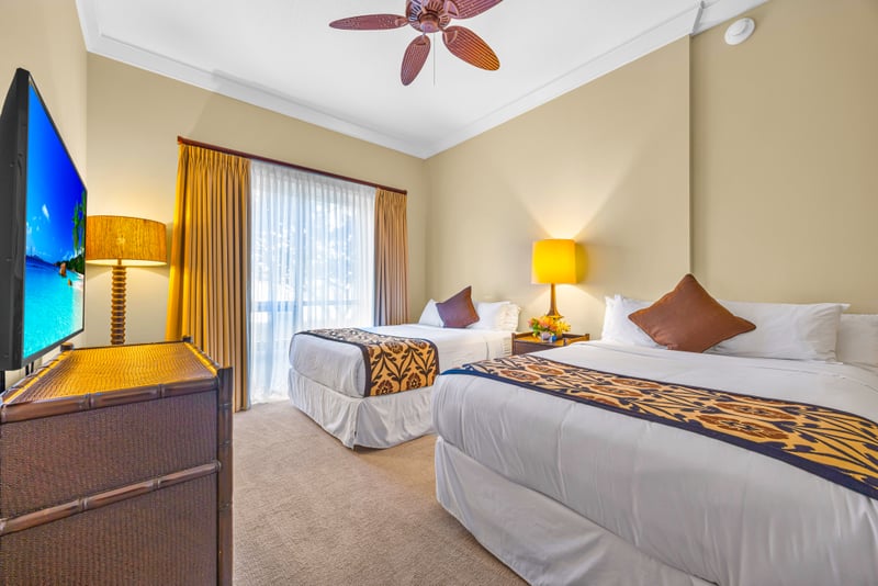 Guest bedroom at Honua Kai HKH-150 — two queen beds ideal for family or friends traveling together