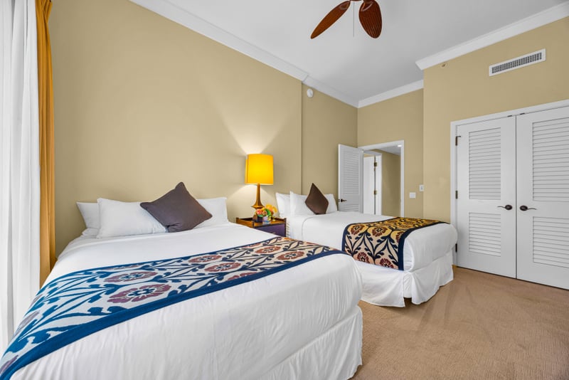 Guest bathroom at Honua Kai HKH-150 — glass walk-in shower and a separate private toilet room