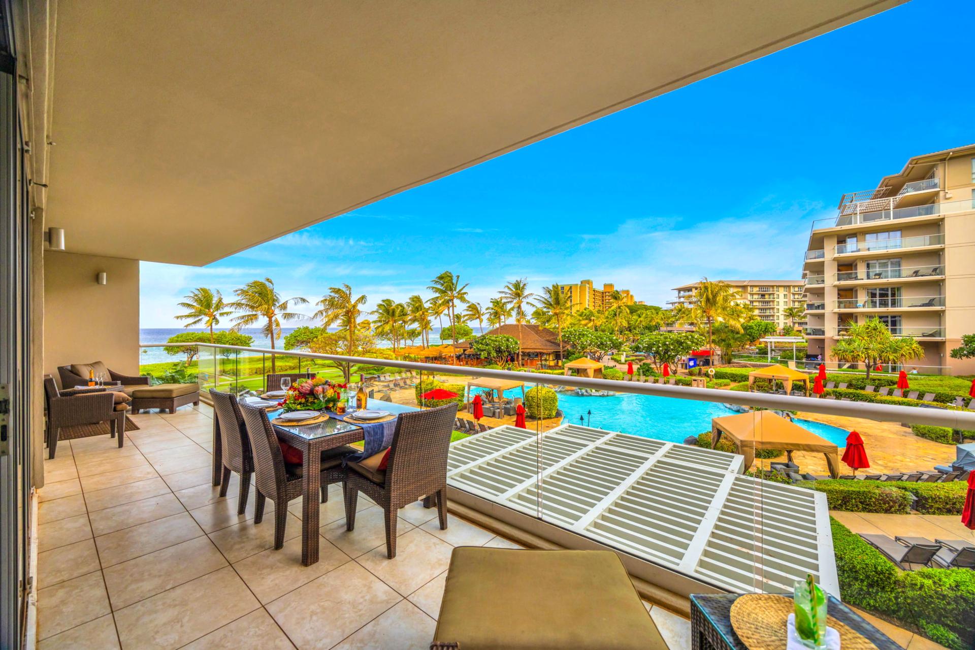 Spacious lanai with dining for six and stunning views over the resort grounds and out to the Pacific. HKH-203