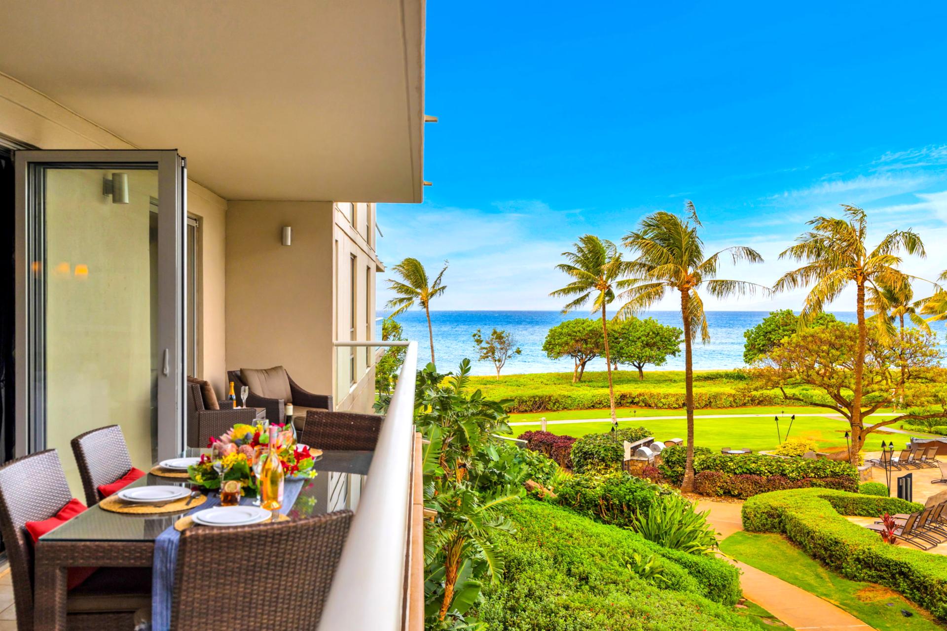 Tropical greenery and ocean glimpses create a tranquil backdrop from the private balcony. HKH-203