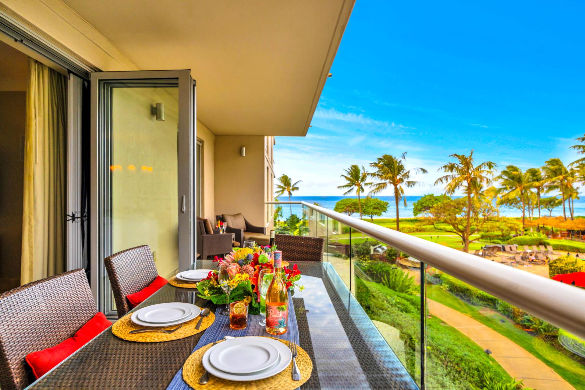 Resort views with a peek of the ocean make this lanai corner a scenic retreat. HKH-203