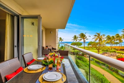 Resort views with a peek of the ocean make this lanai corner a scenic retreat.