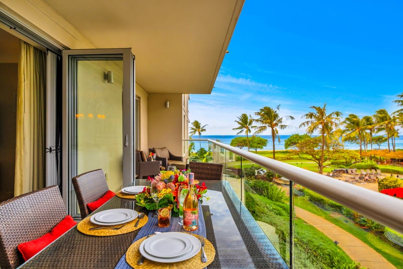 Resort views with a peek of the ocean make this lanai corner a scenic retreat.
