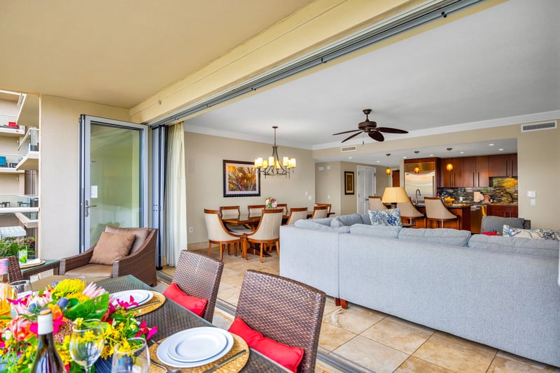 Indoor-outdoor flow from the living area to the balcony brings fresh air and natural beauty inside.