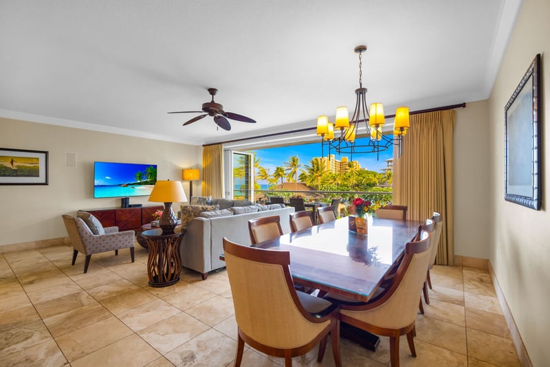 Spacious dining setup flows into the living room, keeping conversation and connection central.