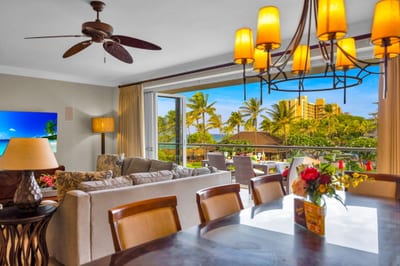Dining area surrounded by windows brings in tropical views for every meal.
