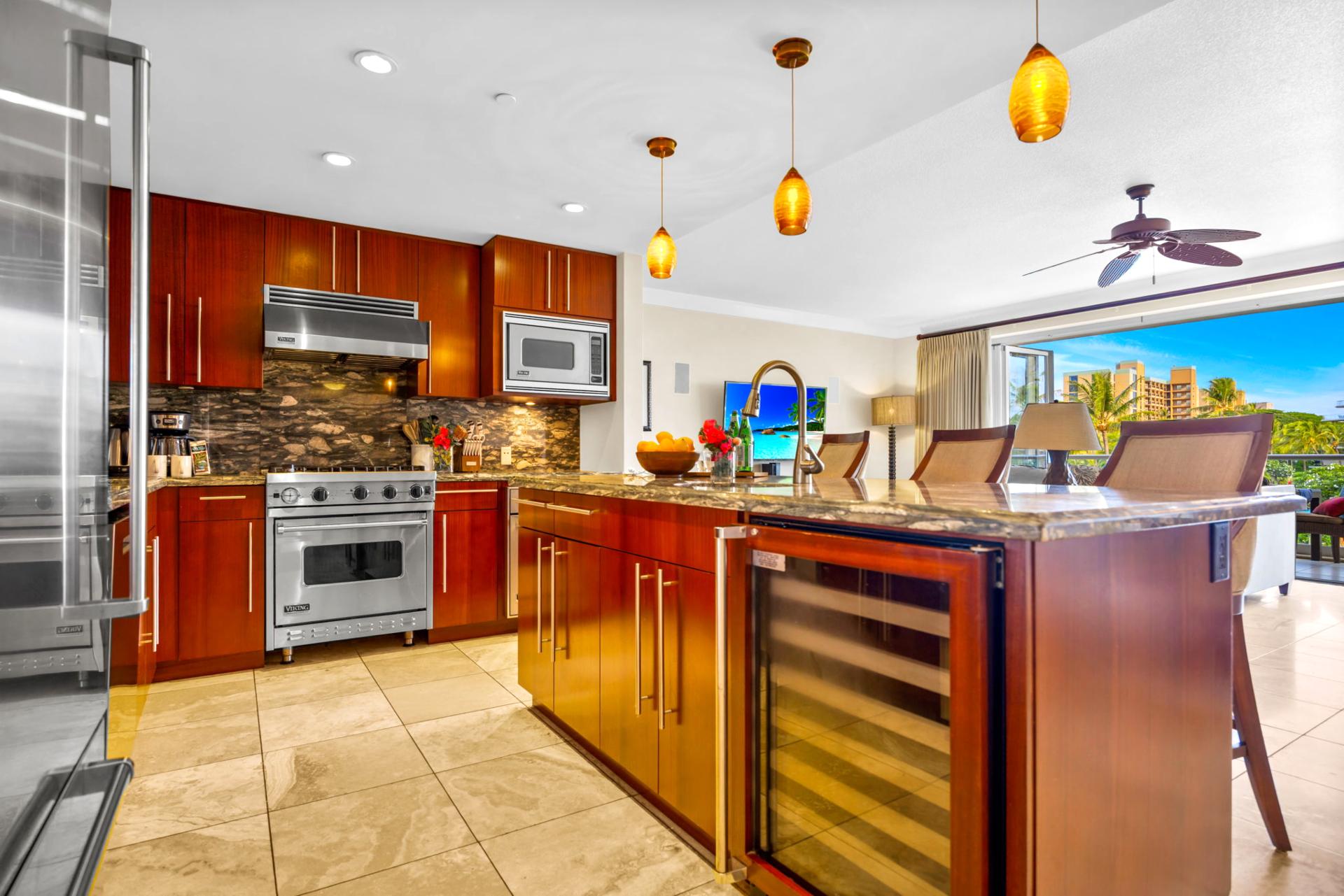 Generous island and full suite of appliances make this kitchen perfect for in-unit meals. HKH-203