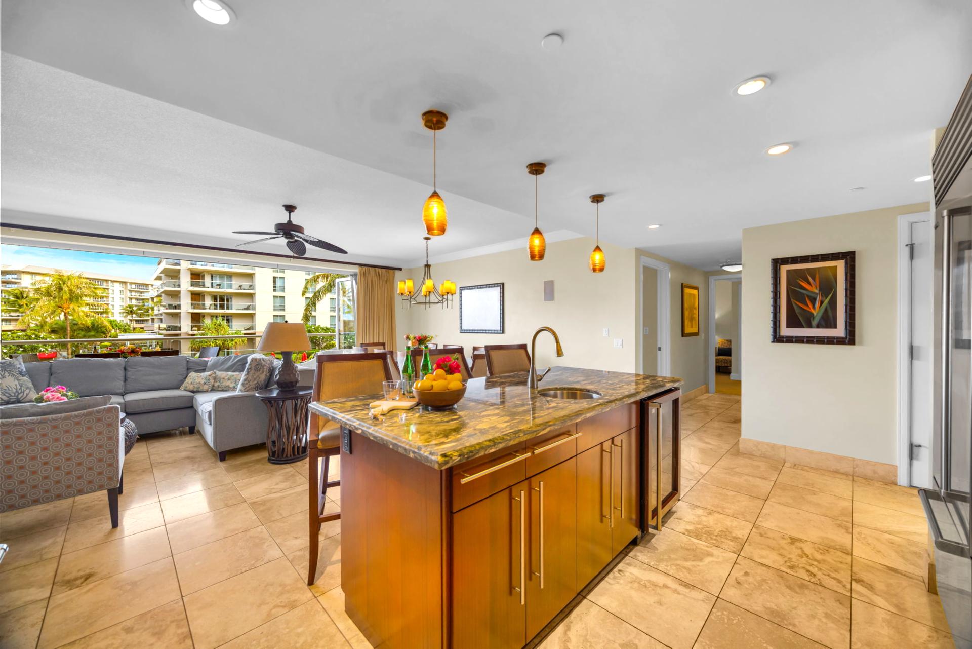 Open-concept kitchen with plenty of prep space and easy access to dining. HKH-203
