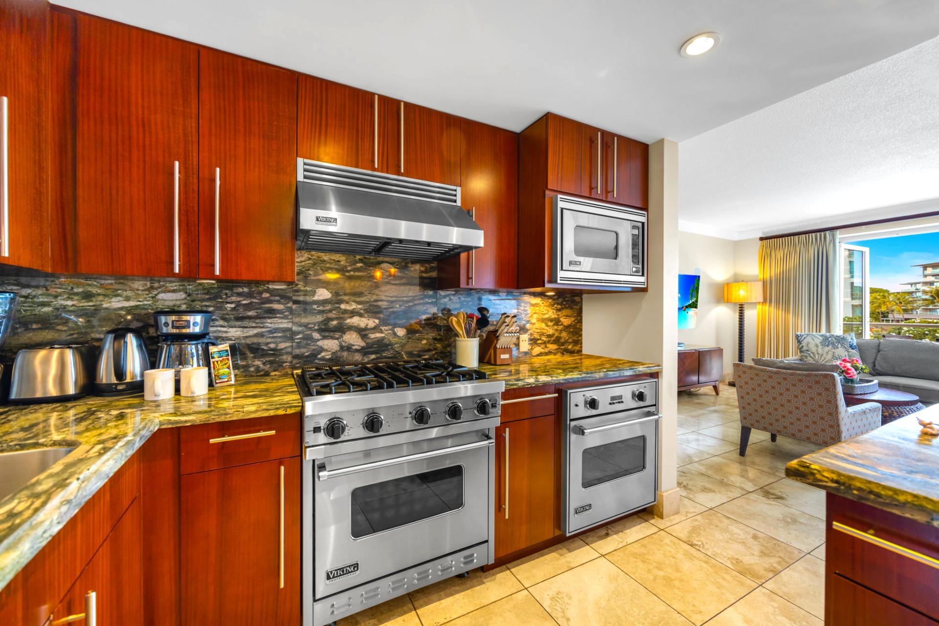 Stainless steel gas range and granite counters for effortless at-home cooking. HKH-203