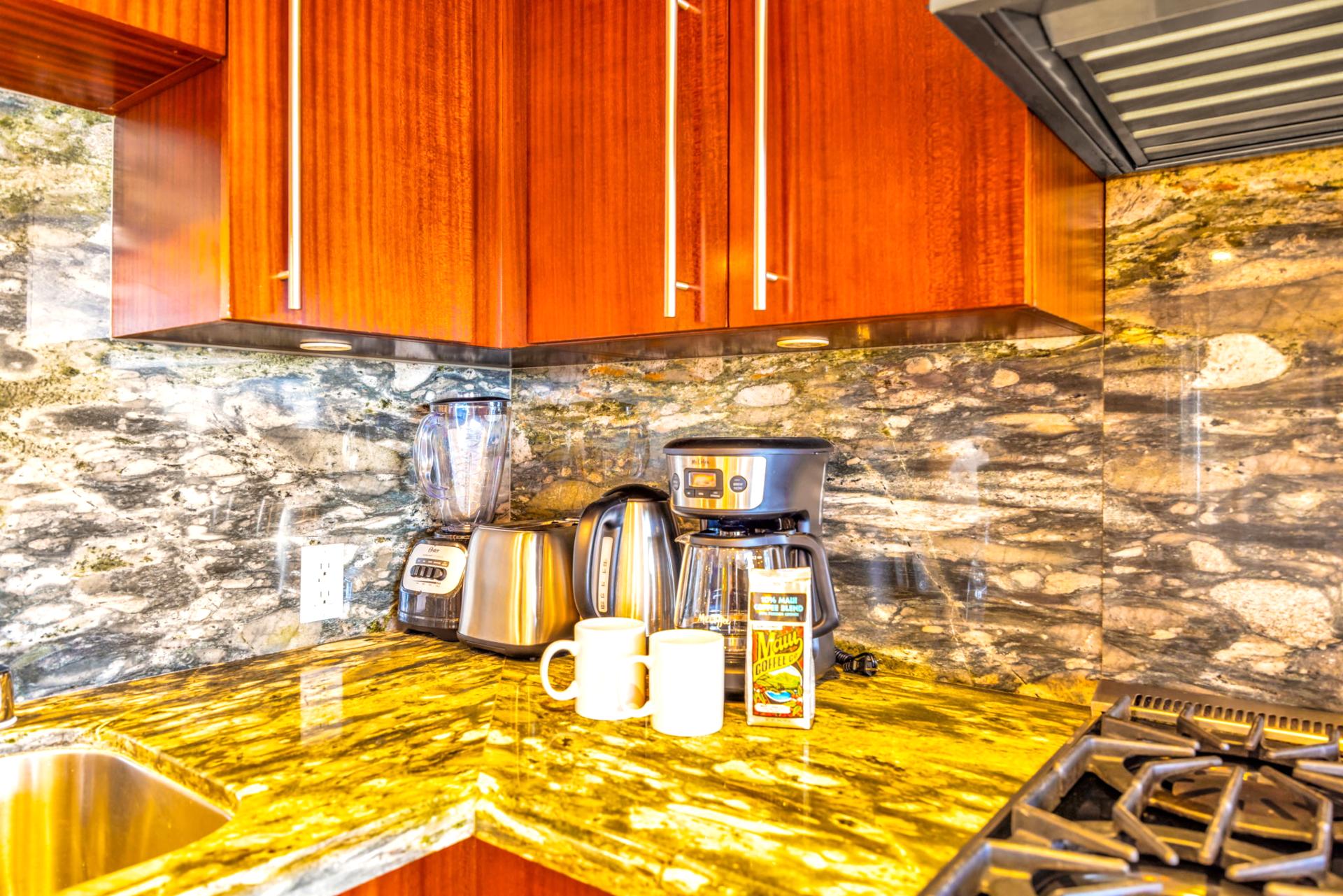 Granite counters and coffee essentials for a smooth start to your mornings. HKH-203