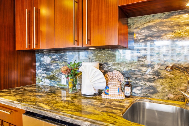 Bright, efficient layout with stylish backsplash and under-cabinet lighting.