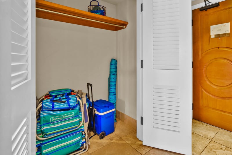 Complimentary beach gear, snorkels, and pool toys organized in this tucked-away storage nook near the entry.